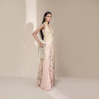 profile shot of Women's blush pink sleeveless embroidered jacket with sheer leaf motifs and neon piping – artistic overlay for stylish party dressing