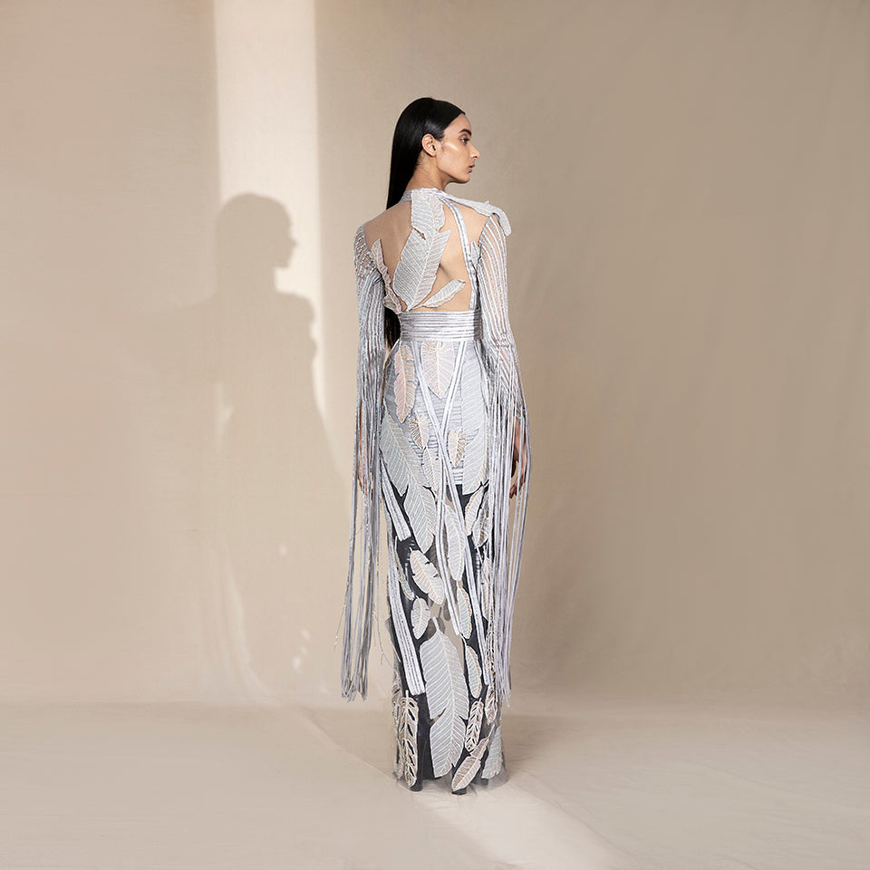 Back view of women's floor-length sheer embroidered jacket with leaf motifs and fringe detailing – bold cocktail co-ord set, modern partywear