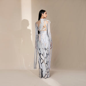 Back view of women's floor-length sheer embroidered jacket with leaf motifs and fringe detailing – bold cocktail co-ord set, modern partywear