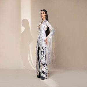 profile shot of Women's sheer embroidered leaf motif jacket with fringe sleeves over high-slit mini skirt – statement co-ord for cocktail parties, modern fusionwear