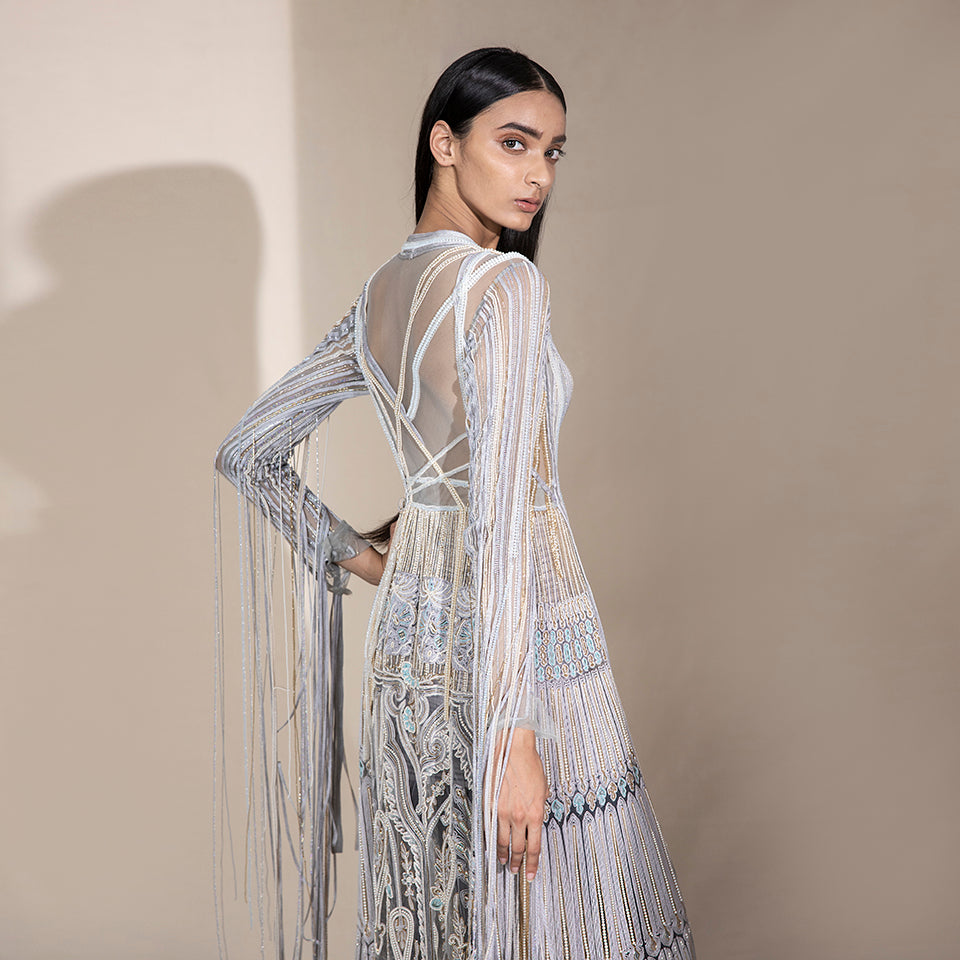 upper back view of Women's sheer embroidered jacket with pearl tassels and cross-back detail – couture fashion layer with intricate embellishments