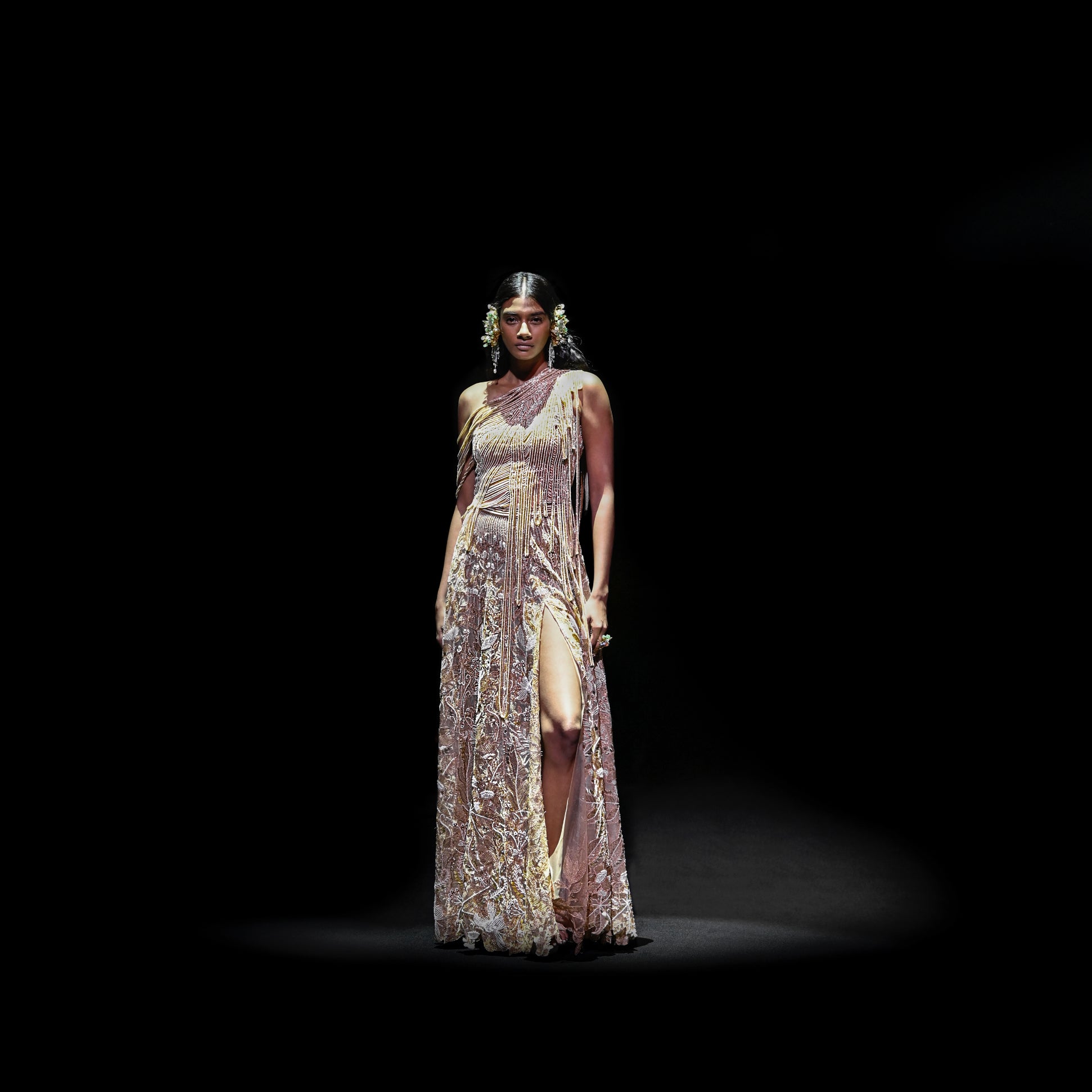 runway view of Women's gold embellished slit gown with one-shoulder fringe detailing – high-fashion cocktail gown, runway eveningwear