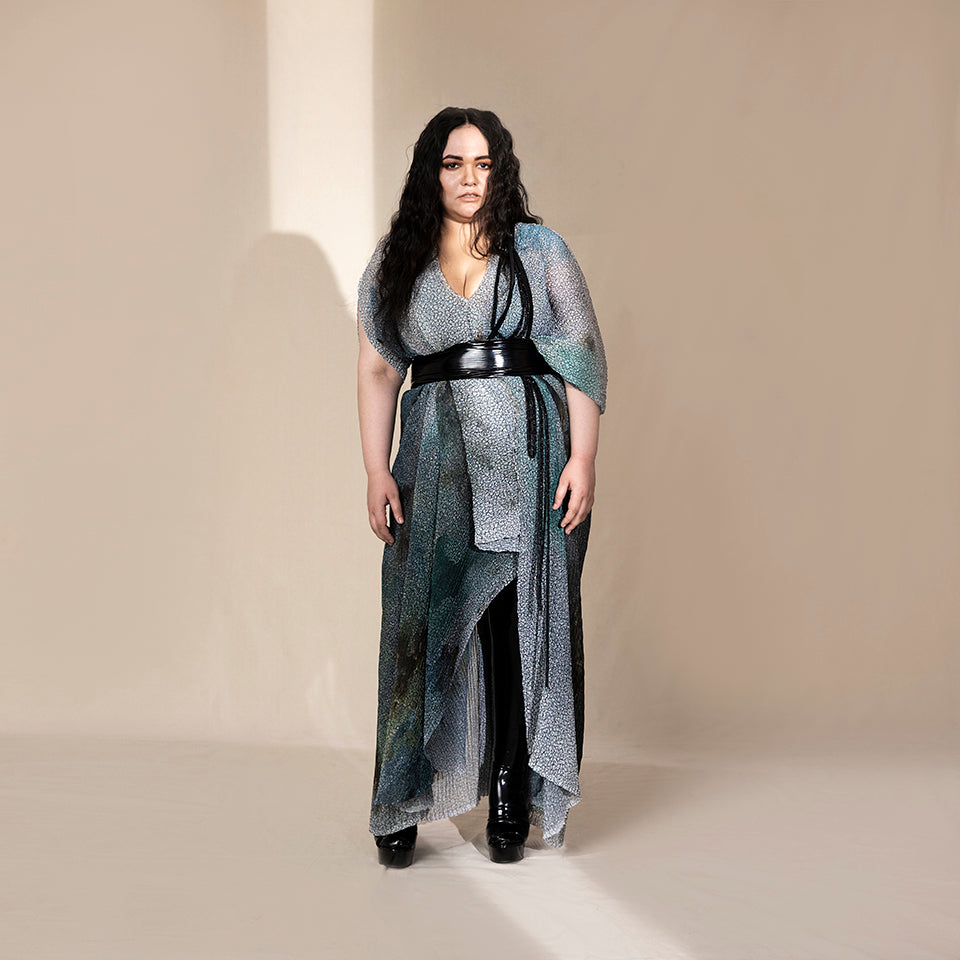 full front view of Women's crystal-textured draped dress with black waist wrap and layered panels – artistic silhouette for youngster party and evening events