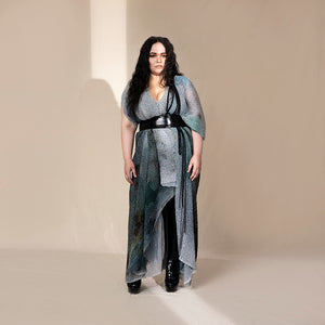 full front view of Women's crystal-textured draped dress with black waist wrap and layered panels – artistic silhouette for youngster party and evening events