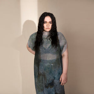 Women's sheer crystallised midi dress with structured neckline and short sleeves – edgy translucent evening look