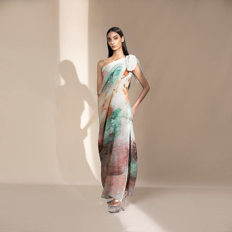 Women's asymmetric crystallised one-shoulder draped gown with sculptural bow and multicolor texture – statement summer couture look
