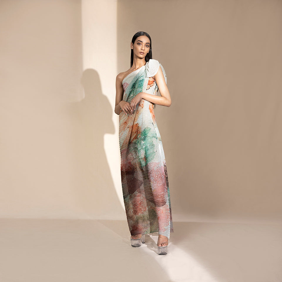 fullbody view of Women's one-shoulder pastel crystallised draped gown with sculpted shoulder tie – artistic summer silhouette with elegant finish