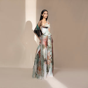 profile shot of Women's one-shoulder crystallised wrap top with fluid abstract wide-leg pants – bold contemporary co-ord for evening elegance