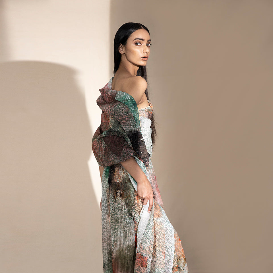 side view of Women's abstract crystallised off-shoulder wrap blouse with pleated pants – sculpted co-ord set for contemporary eveningwear