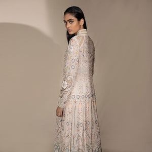 back view of Women's full-sleeve pastel flared jacket with intricate threadwork and high collar – bridal couture outerwear in soft floral shadow embroidery