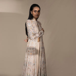 Women's ivory pastel flared jacket with fine floral shadow embroidery and standing collar – handcrafted couture for bridal events