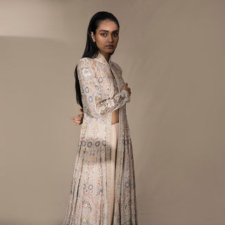 Women's ivory pastel flared jacket with fine floral shadow embroidery and standing collar – handcrafted couture for bridal events