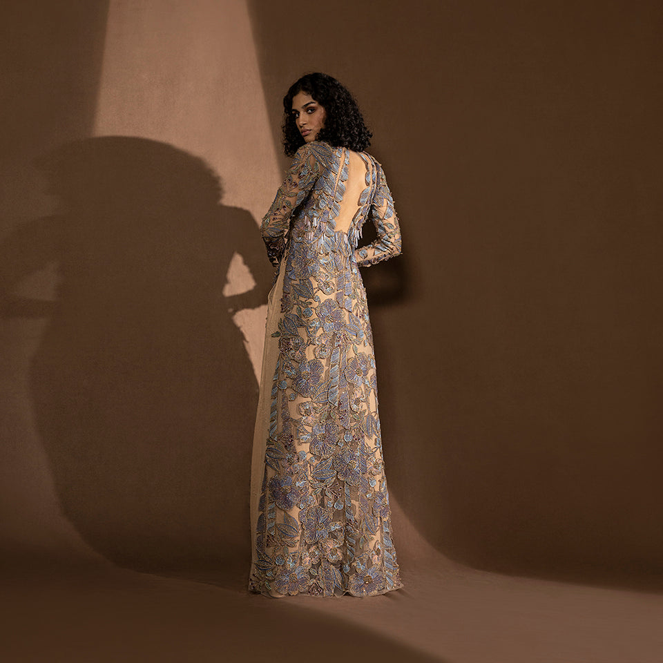 back view of Women's floral embroidered floor-length jacket with open back and sheer full sleeves – couture reception ensemble, flared silhouette