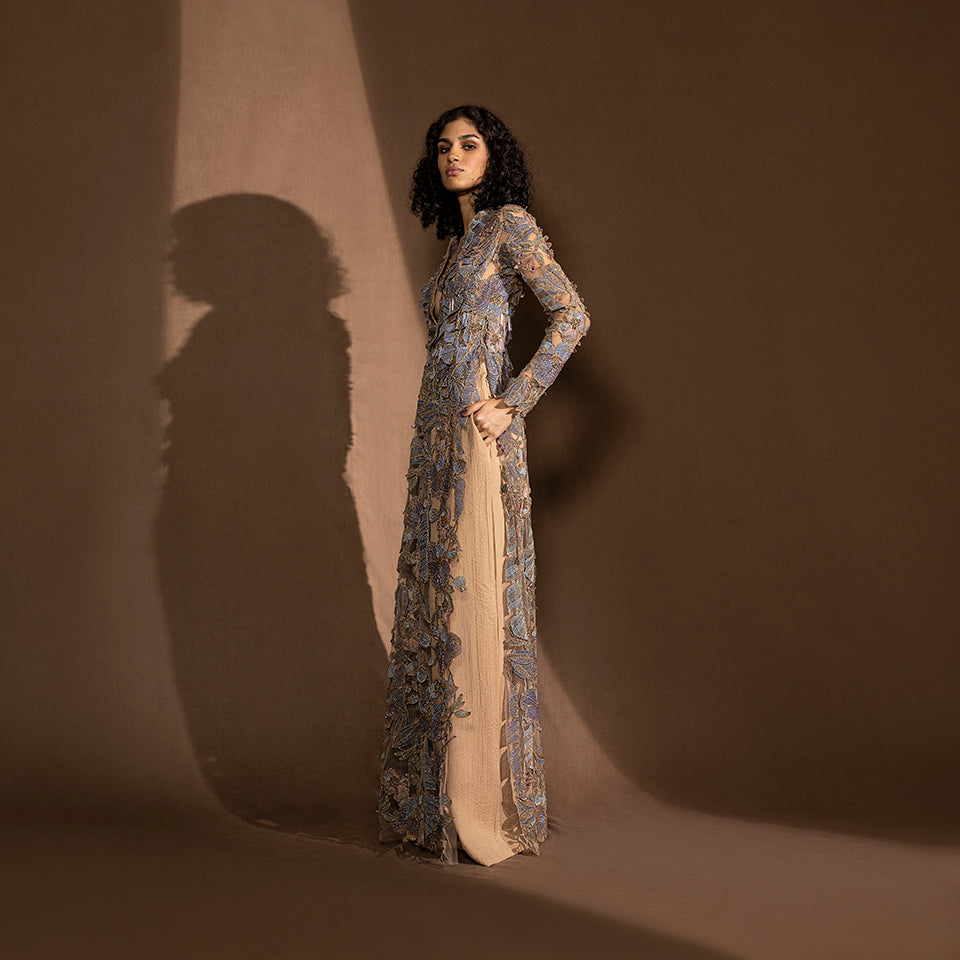 side shot of Women's floor-length embroidered jacket with side slit and sheer full sleeves – flared couture overlay, reception statement piece
