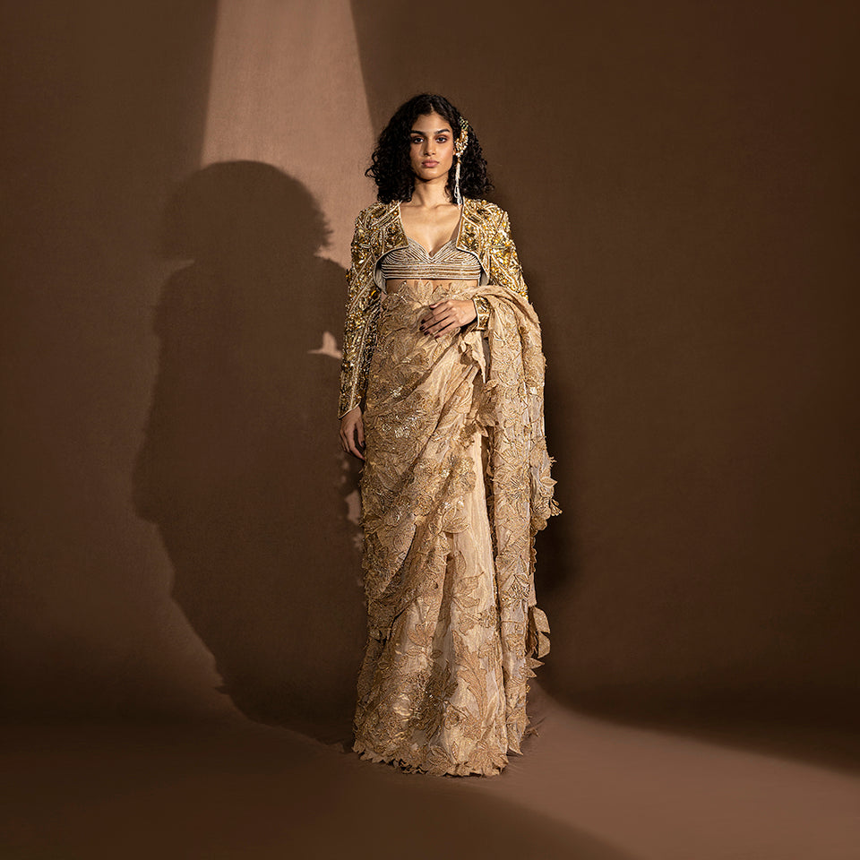 Women's metallic Chanderi saree with sequin floral embroidery and structured yoke blouse – layered pre-pleated draped saree with full sleeve shrug, modern festive couture