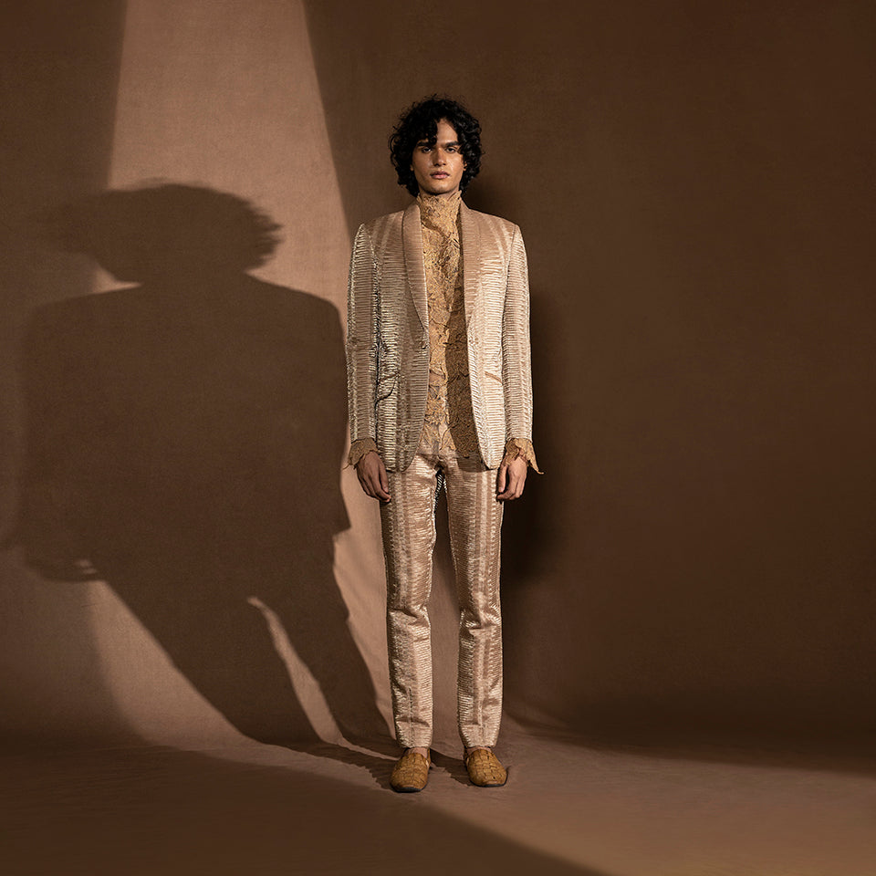 front shot of Men's metallic pleated one-button suit with lace shirt – refined cocktail menswear, structured contemporary formal look