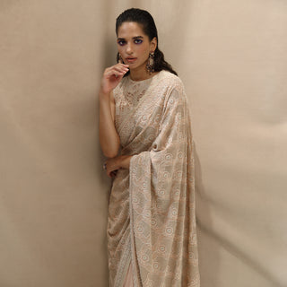Women's pre-draped chikankari saree with floral jaali embroidery and scalloped pallu – timeless handcrafted elegance for ceremonial occasions