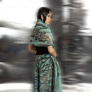 back view of Women's reef textured coord set back view with sculpted wrap top and flowing wide-leg trousers – oceanic drape in contemporary couture