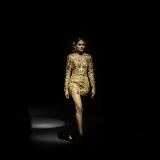 runway shot of Women's crystal-embellished short dress with geometric embroidery and fitted waist – metallic runway mini for high-glam evening events