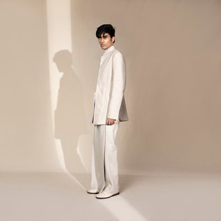 side view of Men's ivory chevron-pattern Bandhgala with wide-leg trousers – minimal textured Indian suit for festive occasions