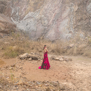 wide shot of Women's backless gown with sculptural applique – dramatic designer dress for red carpet events