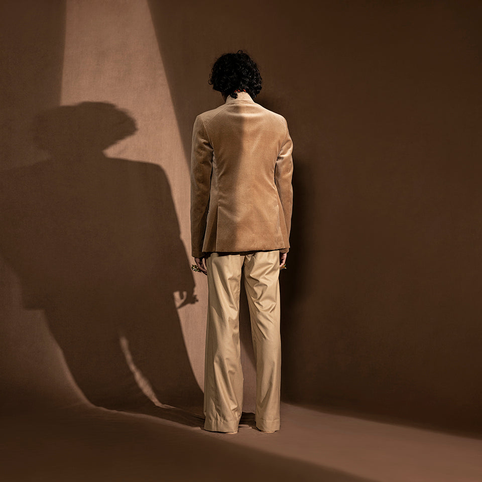 back view of Men's velvet Bandhgala with clean back tailoring and straight-cut trousers – minimal festive wear with classic structure, ideal for modern occasion styling